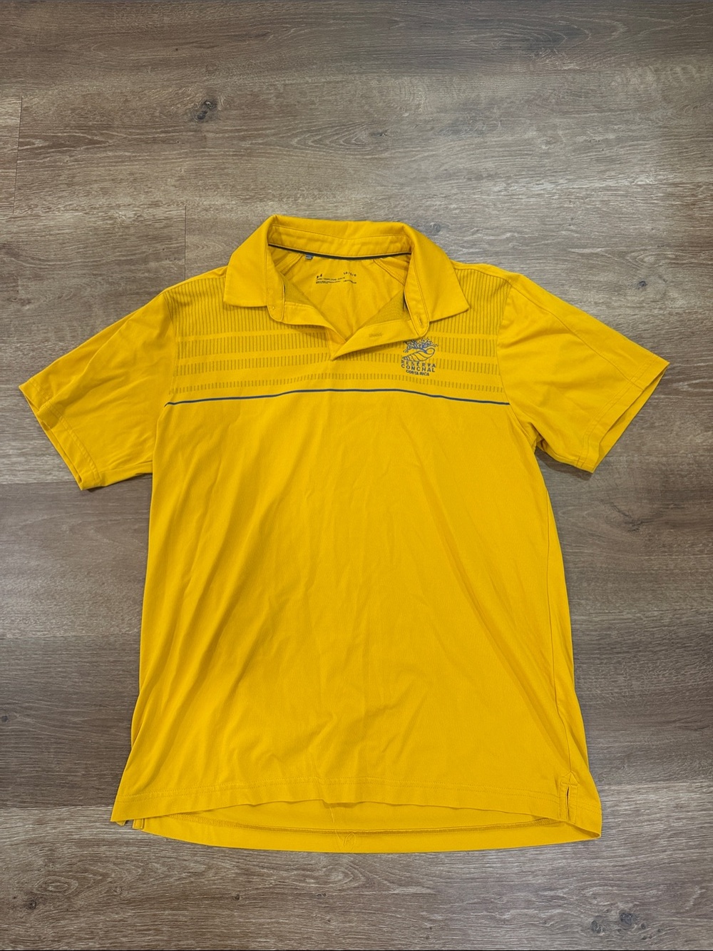 Under Armour Men’s Gold Polo with Subtle Chest Stripe
